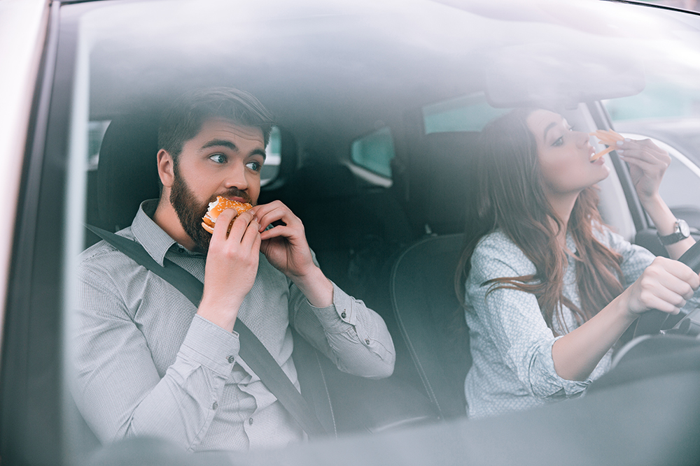 | Schaefer Autobody Centers Couple eating in car