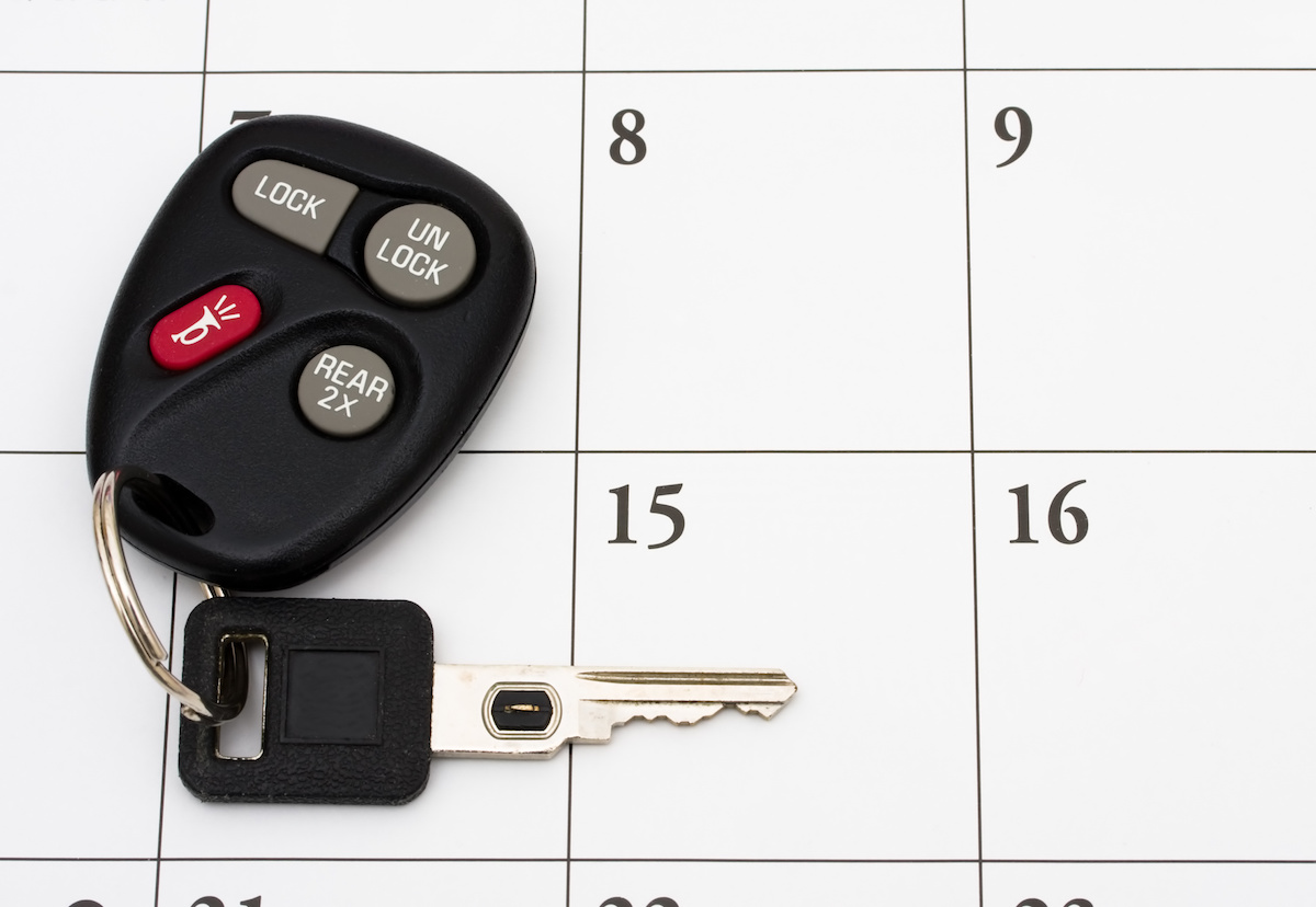 A set of car keys on a calendar