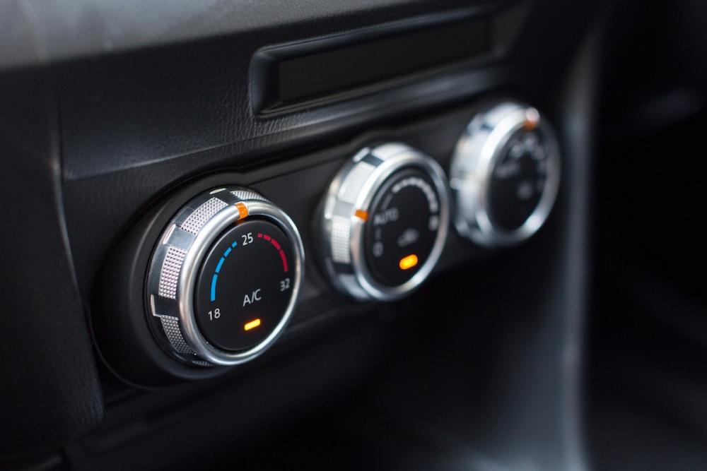 | Schaefer Autobody Centers Car air conditioning control panel inside a car. Car interior