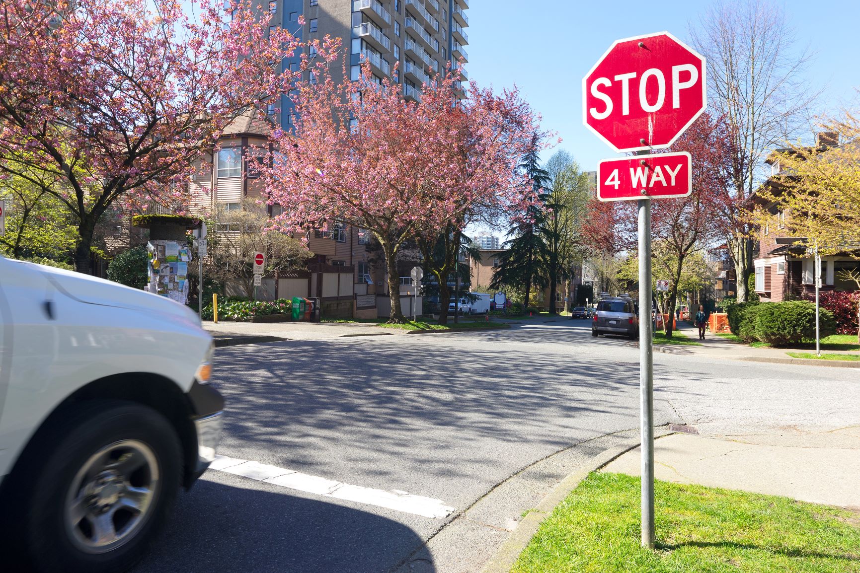 car parked at stop sign