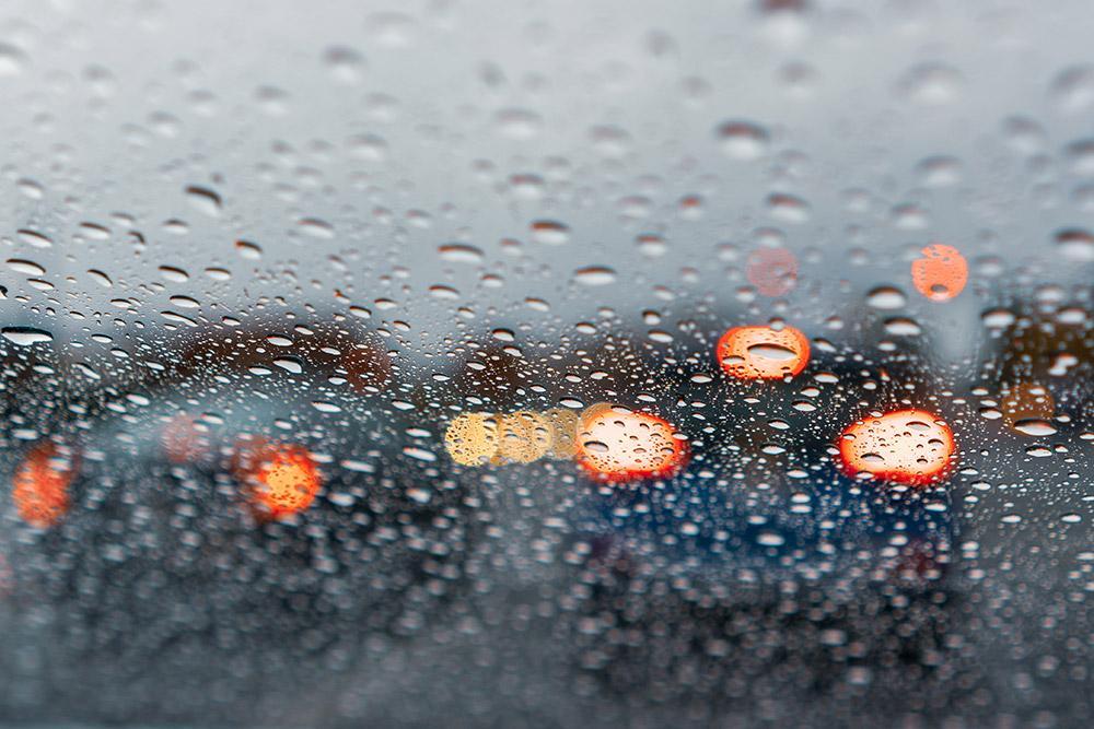driving-in-rain | Schaefer Autobody Centers Driving a car in wet conditions