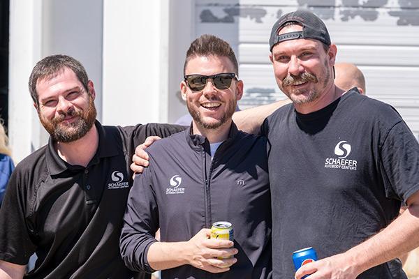 Workers at Creve Coeur body shop enjoy a food truck event for lunch