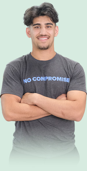 No Compromise worker with arms folded
