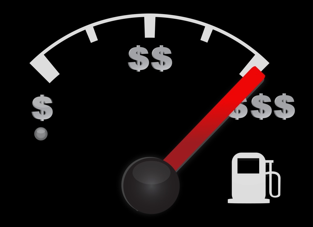 Gas gauge of a car with dollar symbols | Schaefer Autobody Centers gas gauge mileage
