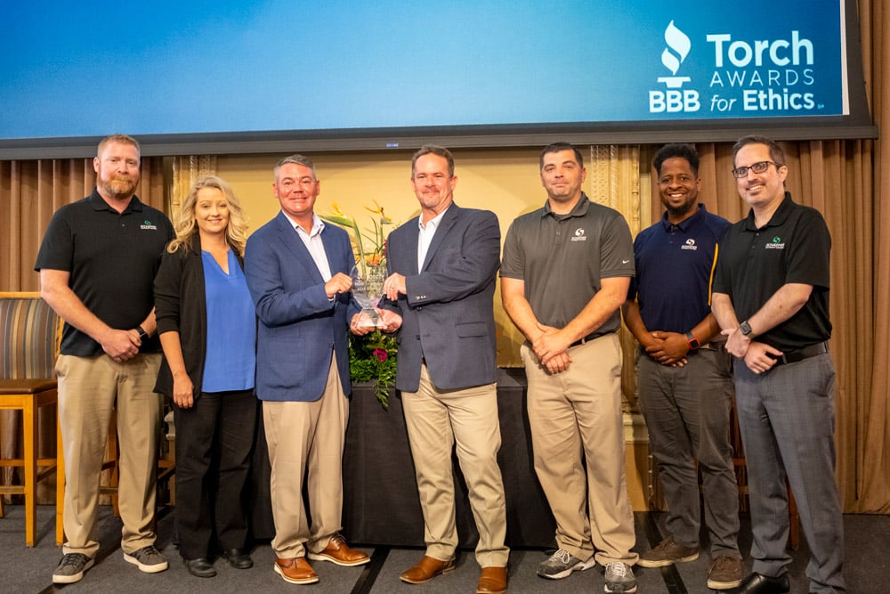 Torch-Awards | Schaefer Autobody Centers Schaefer on stage at the Torch Awards